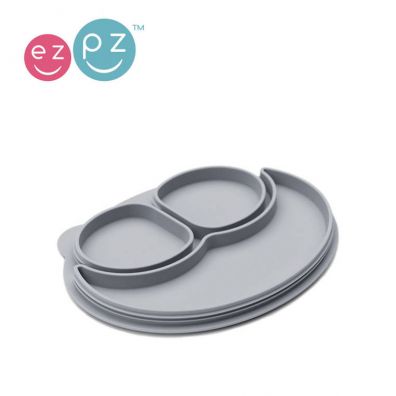 Ezpz Silikonowy talerzyk z podkładką mały 2w1 Mini Mat + pokrywka GRATIS pastelowa szarość Ezpz Silikonowy talerzyk z podkładką mały 2w1 Mini Mat + pokrywka GRATIS pastelowa szarość
