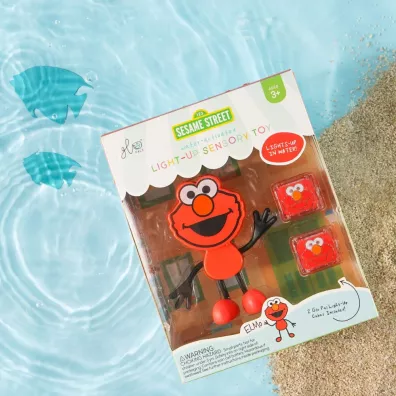 Glo Pals Posta� do k�pieli Elmo - zestaw z dwiema kostkami sensorycznymi �wiec�cymi w wodzie