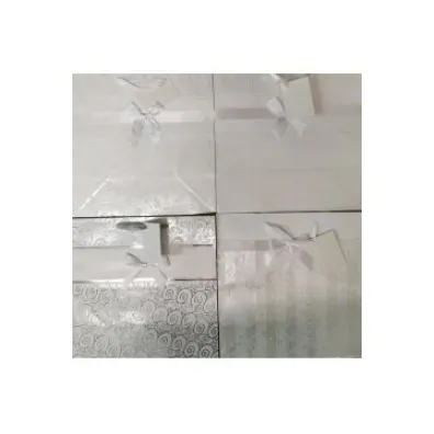Panorama Torebka ozdobna z�ocona z kokard� PL-5KZ midi