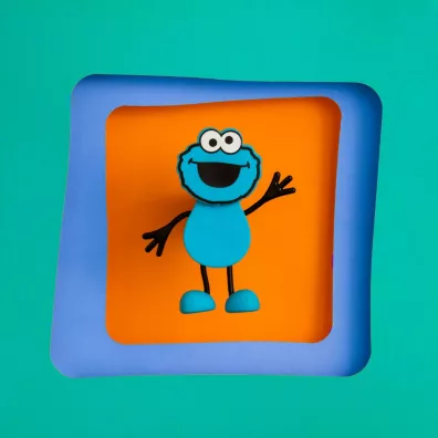 Glo Pals Posta� do k�pieli Ciasteczkowy Potw�r - zestaw z dwiema kostkami sensorycznymi �wiec�cymi w wodzie