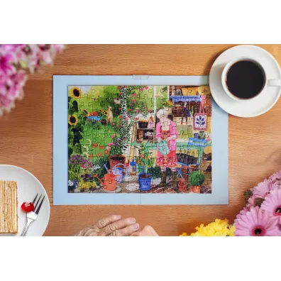 Puzzle 100 el. XL Ogr�d Ravensburger