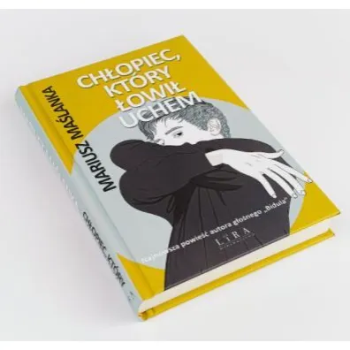 Ch�opiec, kt�ry �owi� uchem