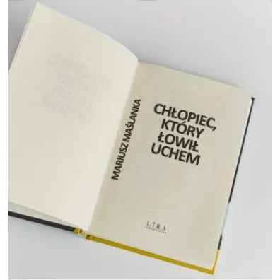 Ch�opiec, kt�ry �owi� uchem
