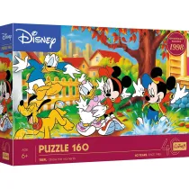 Puzzle 160 40lecie  - Zabawa w kauach Trefl
