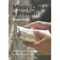Mi�dzy �ask� a Prawem